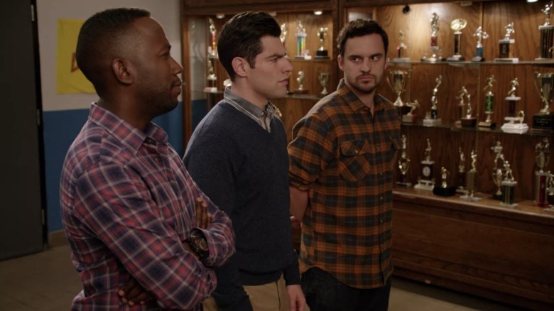 Nick, Winston, and Schmidt frown