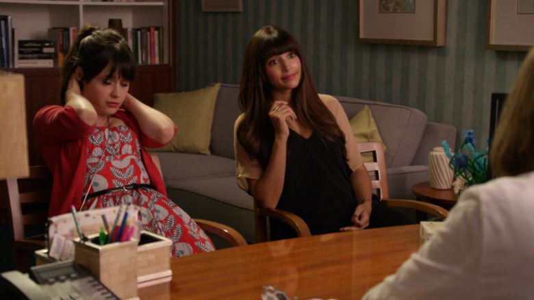 Jess and Cece sitting down in office