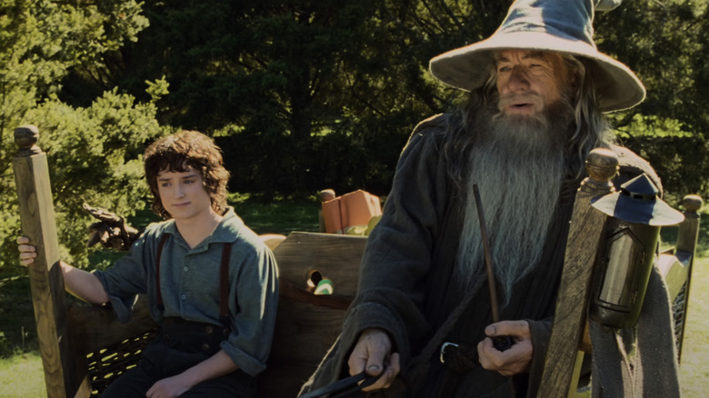 Gandalf and Frodo sitting and talking together