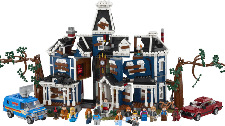 Creel House LEGO set with characters' minifigs in front of it
