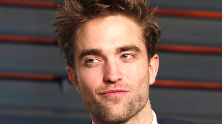 Robert Pattinson smirking