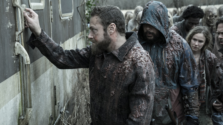 Aaron opening an RV door on The Walking Dead