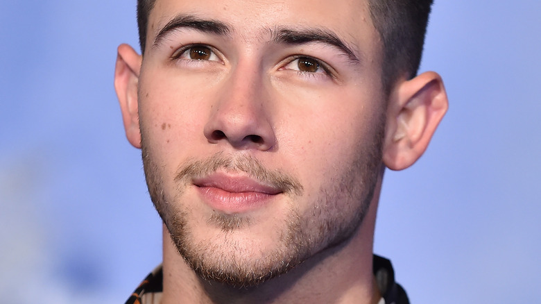 Nick Jonas small smile