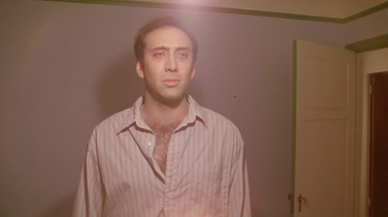 Ben Sanderon looking at himself in the mirror in Leaving Las Vegas (1995)