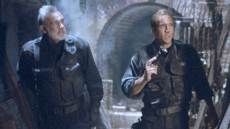 Captain John Patrick Mason and Dr. Stanley Goodspeed making a sneaky sewer entrance in The Rock (1996)