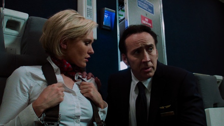 Nic Cage and Nicky Whelan in Left Behind