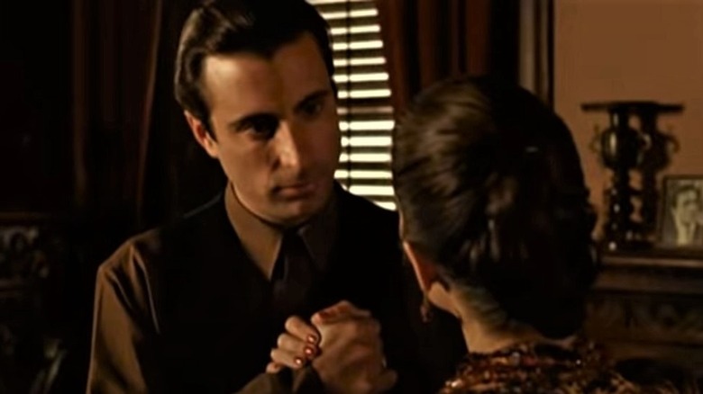 Andy Garcia holding hands