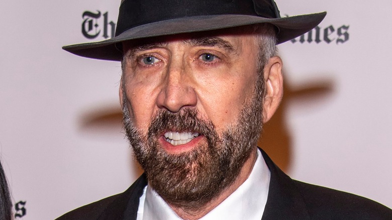 Nic Cage wearing a fedora