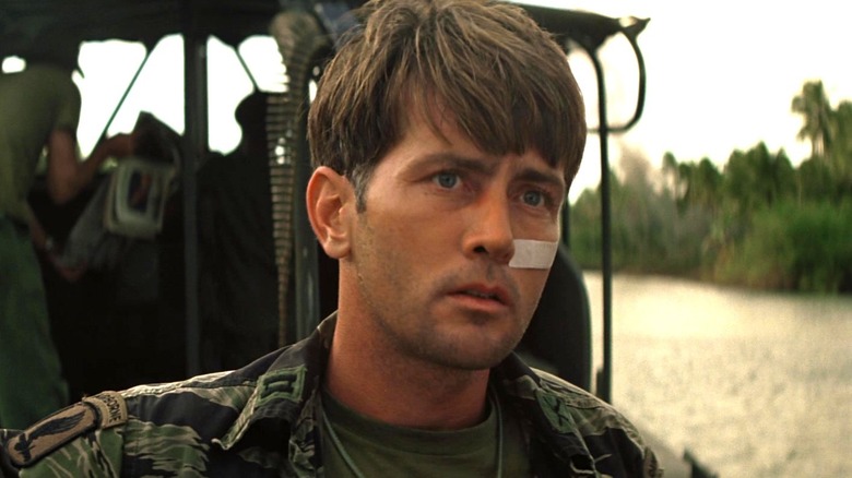 Captain Benjamin L. Willard staring into the distance in Apocalypse Now