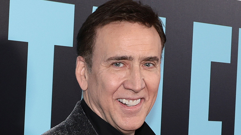 Nicolas Cage smiling into camera