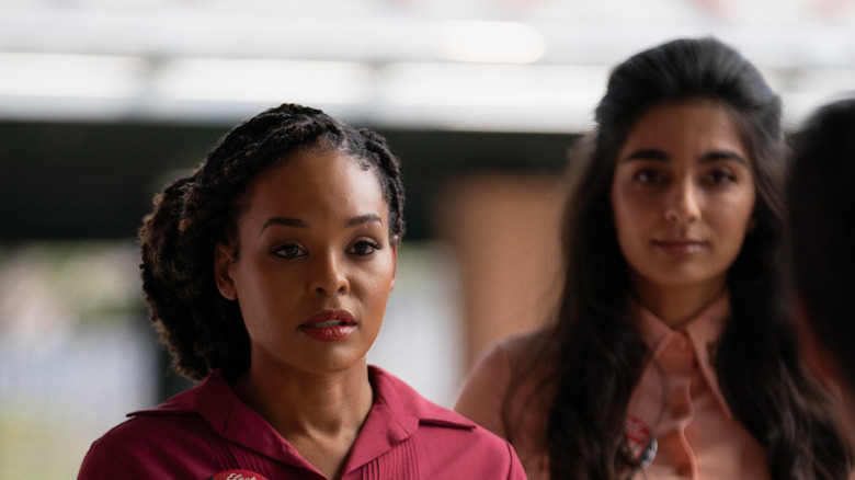 Ada and Latika looking concerned