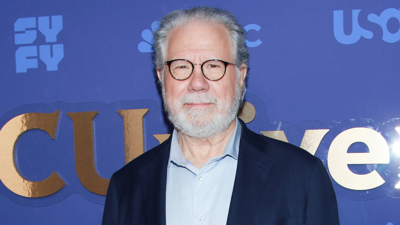 John Larroquette wearing glasses