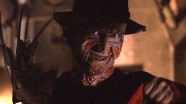 Freddy Krueger holds up his claws