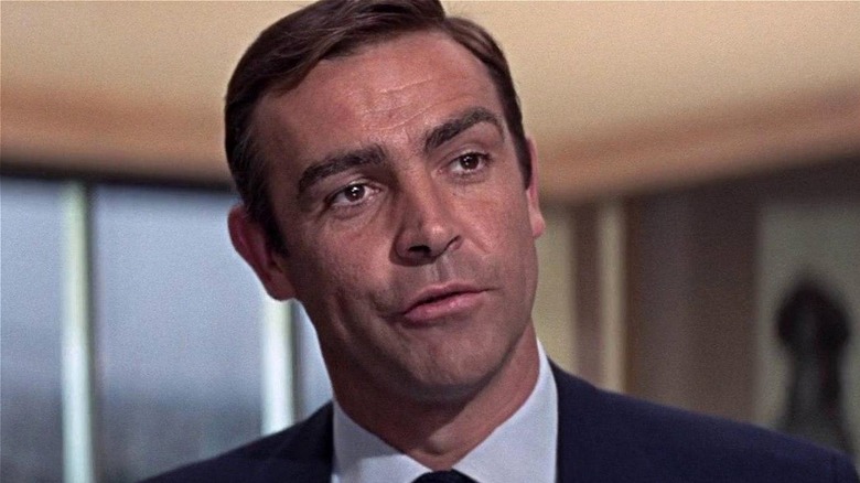 James Bond cocking his head in 