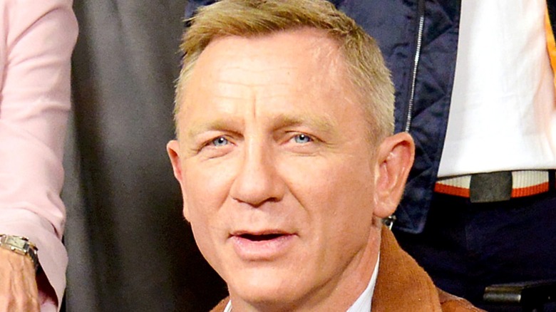 Daniel Craig smiling at camera