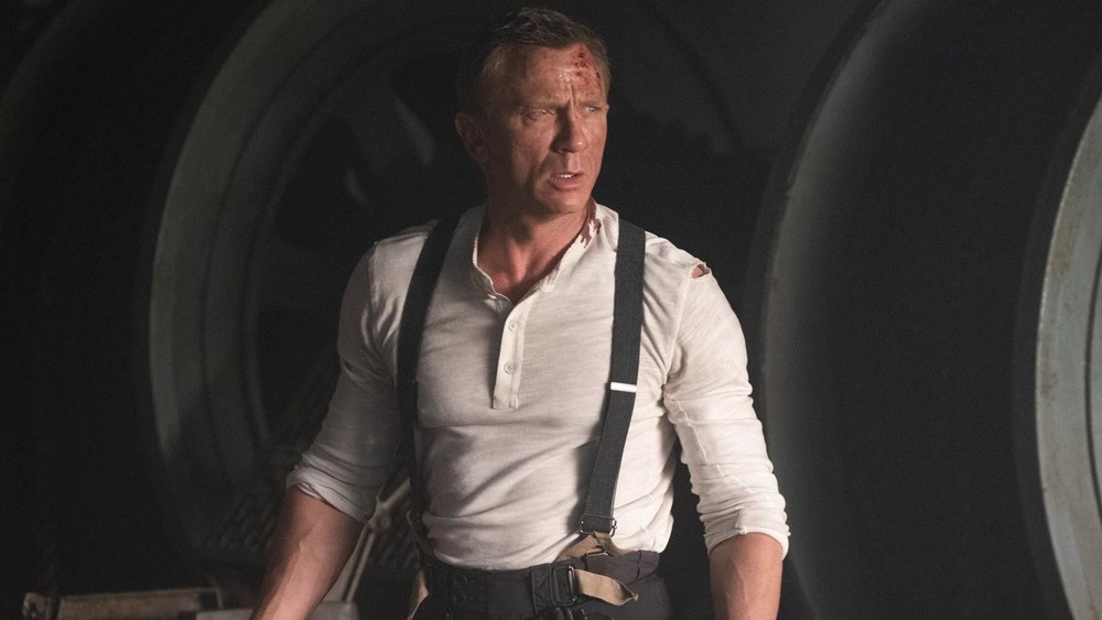 Daniel Craig as Bond in suspenders