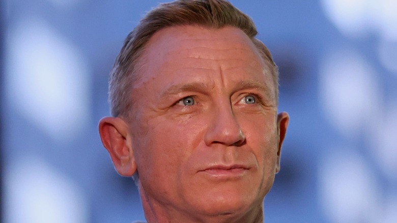 Daniel Craig looks up