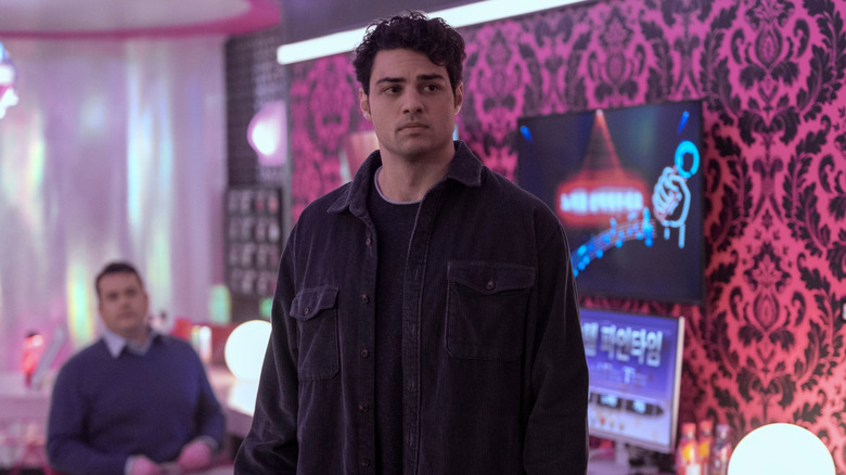 Owen standing in office in "The Recruit"