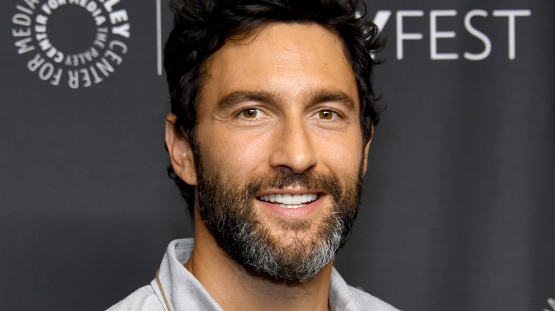 Noah Mills smiling