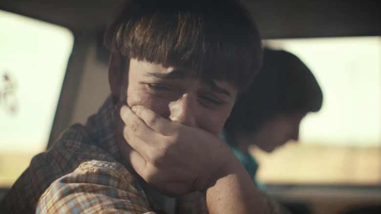 Will crying in the car with Mike behind him