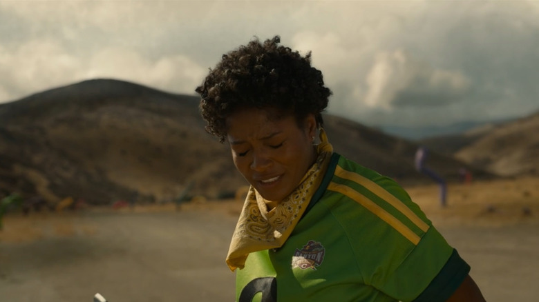 Emerald Haywood looking down with eyes closed