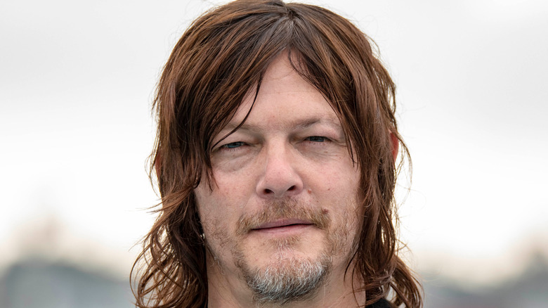 Norman Reedus smirking