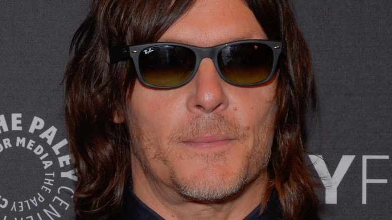 Norman Reedus wearing sunglasses