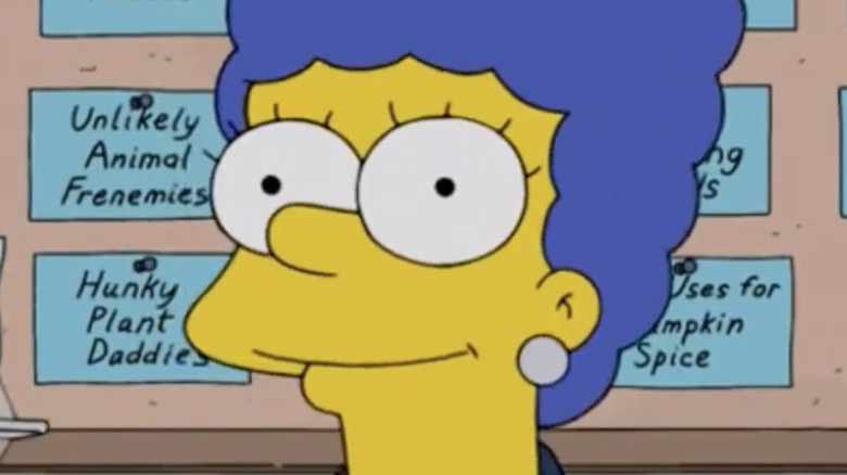 Marge Simpson sitting in front of a wall of segment ideas
