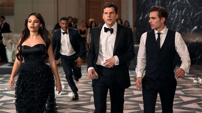 June, Atlas, and Jack at the gala dressed up in disguise in Now You See Me: Now You Don't