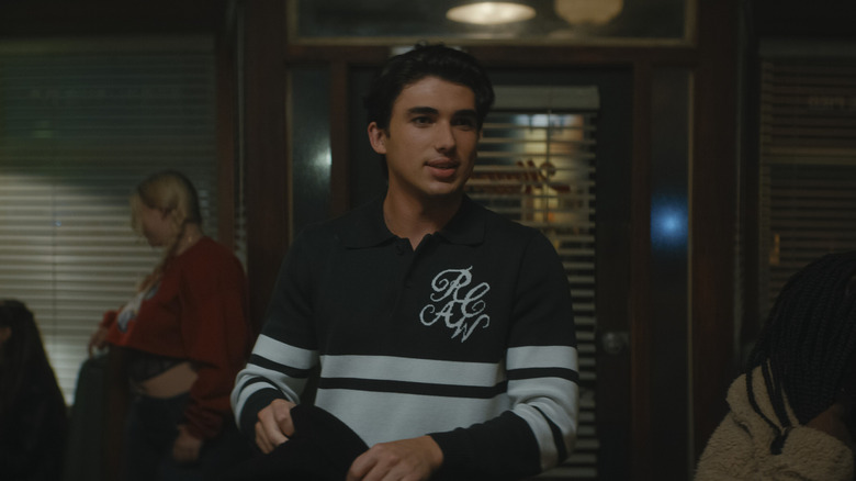 Hunter Davenport wearing a black and white shirt on Off Campus