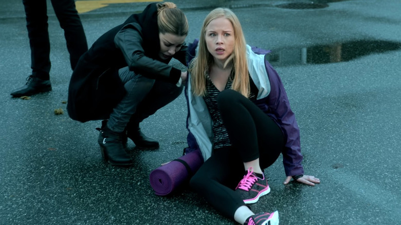 Debra laying on street