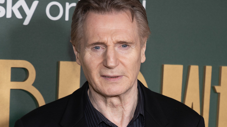 Liam Neeson smiling 