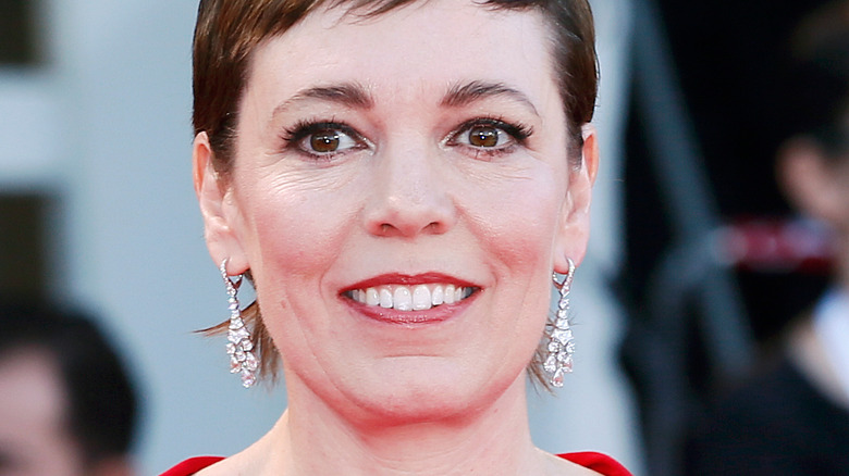 Olivia Colman smiling red dress