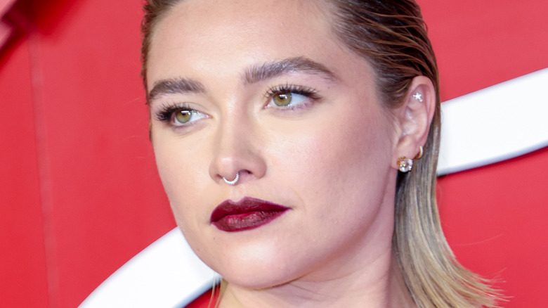 Florence Pugh posing for press