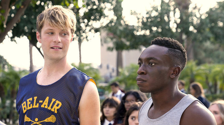 Carlton walking on campus with his friend