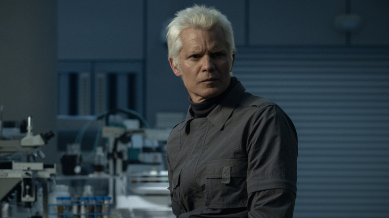 Kirsh, scowling, in the laboratory in 