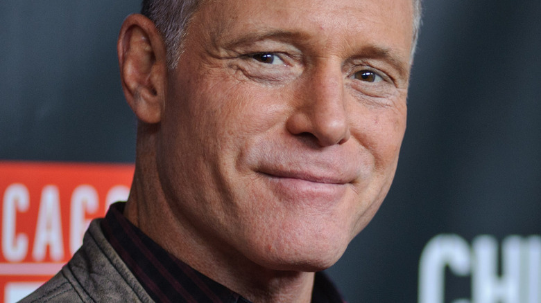 Chicago P.D. actor Jason Beghe smiles
