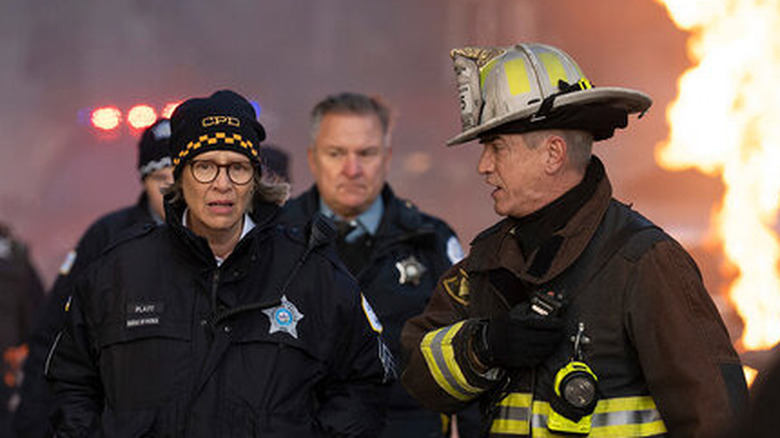 Trudy Platt and Dom Pascal walk through fire in "Chicago Fire" (2012-present)