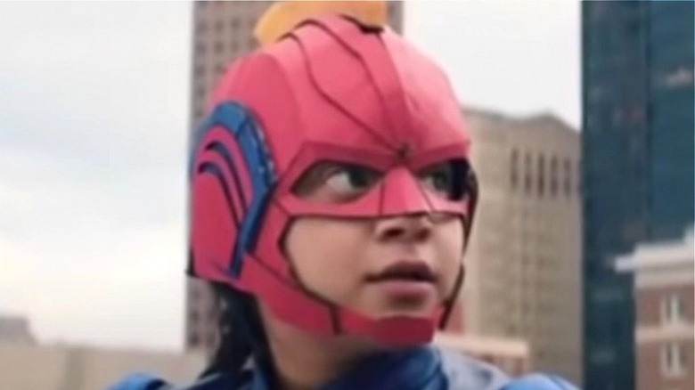 Kamala Khan wearing Captain Marvel helmet