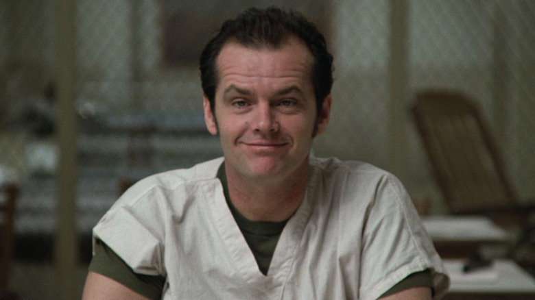 Jack Nicholson smiles with eyebrows raised