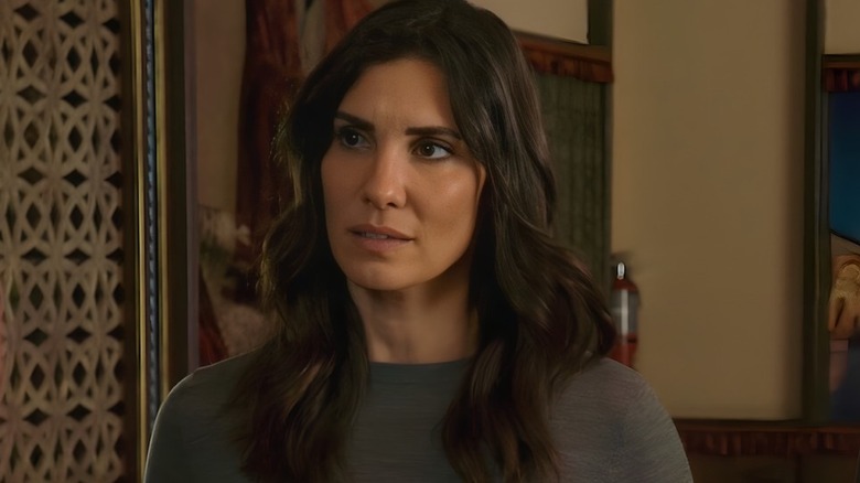 Kensi Blye wearing grey sweater