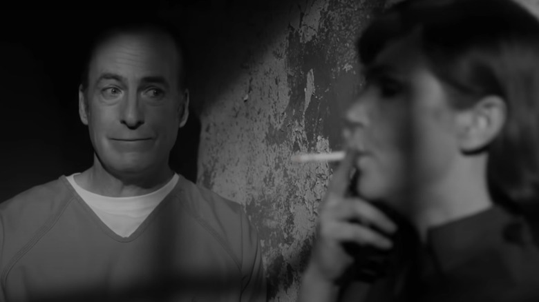 Jimmy and Kim share a cigarette