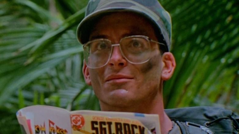 Hawkins reading a Sgt. Rock comic book in 1987's Predator