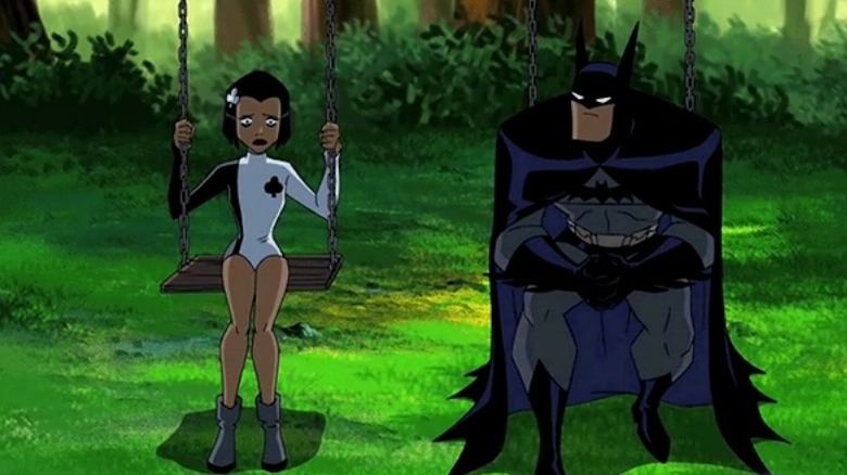 Batman sitting with Ace