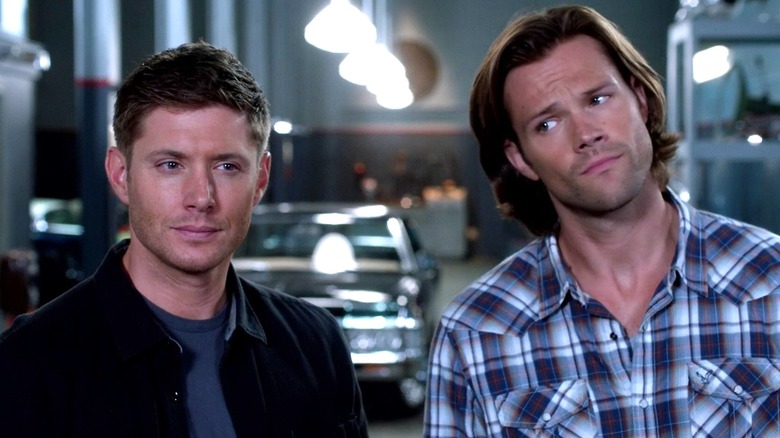 Sam and Dean in a garage in Supernatural