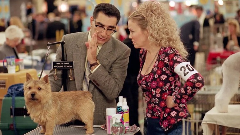 Cookie and Gerry confer at a grooming table in Best in Show (2000)