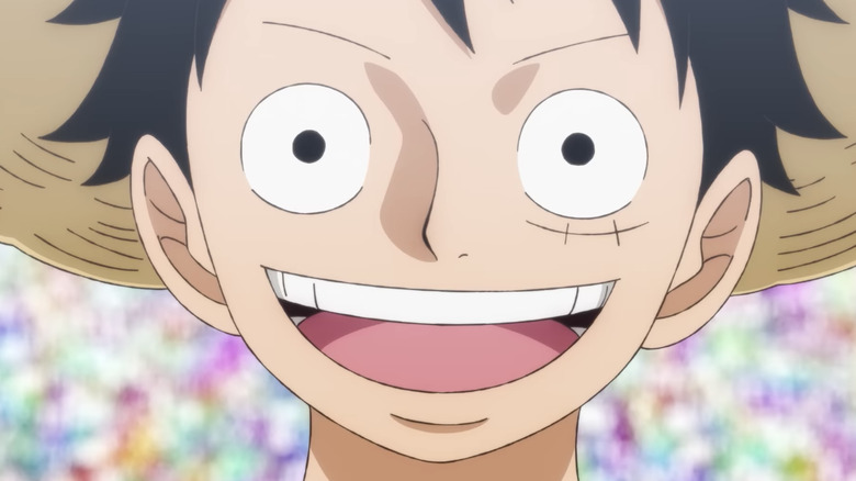 Luffy smiling at Uta's concert