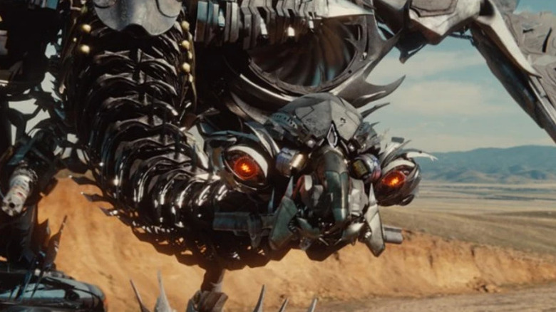 Laserbeak extending his long neck with a mechanical snarl in Transformers: Dark of the Moon (2011)