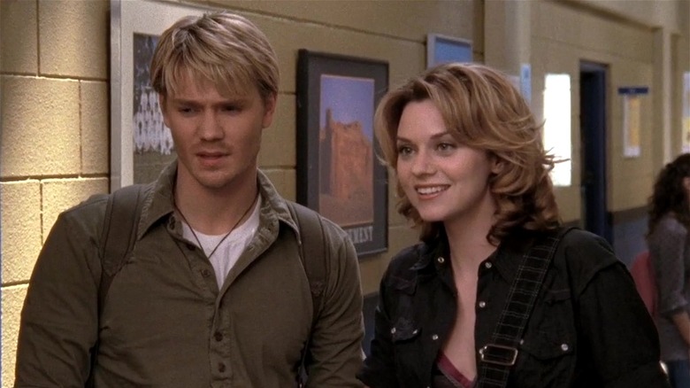 Lucas and Peyton staring at a classmate