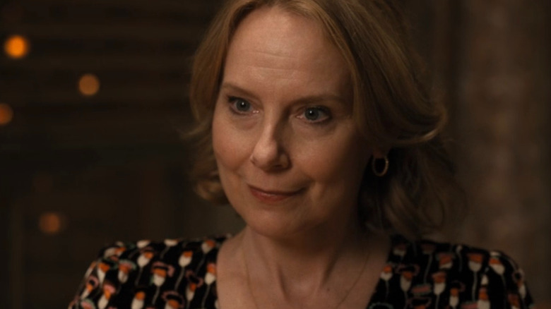 Jan smiling at Charles